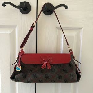 Dooney & Bourke leather flap tassel bag with signature “DB” pattern